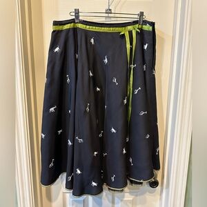 Lapis silk skirt, black with animals and lime green trim, size Large